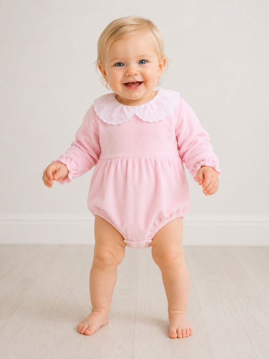 The softest pastel pink velour romper
